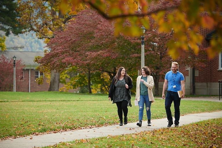 Students walking in front of academic building